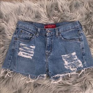 Levi ripped mid waist shorts